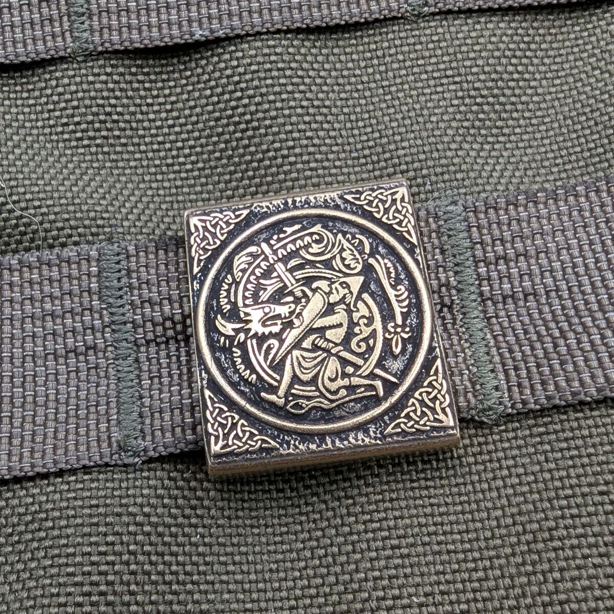 Sigurd and Fafnir molle clip