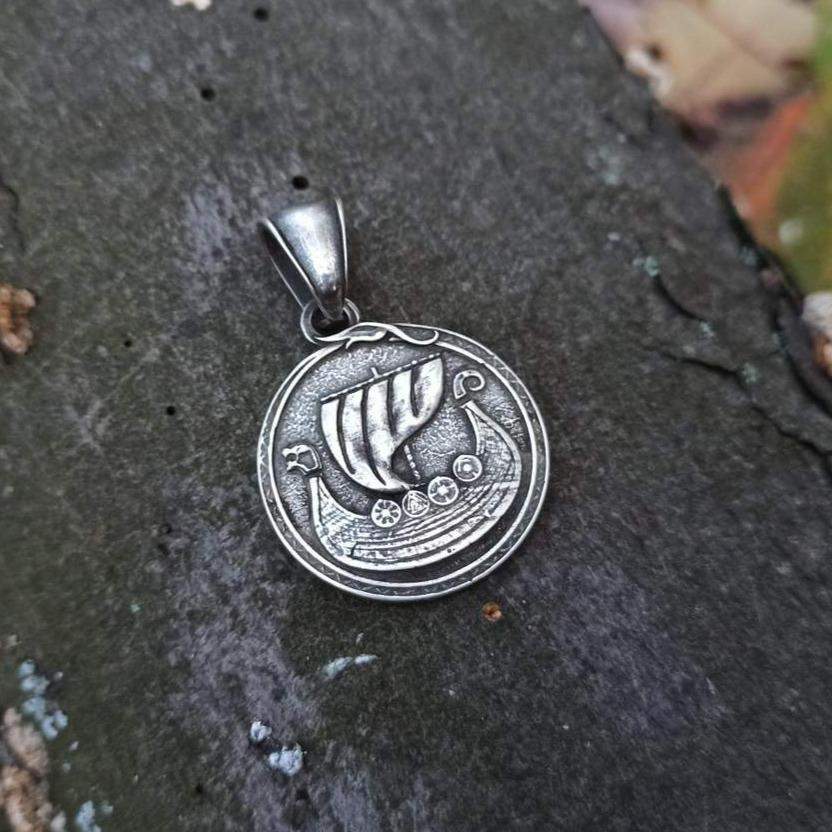 Viking long ship pendant with Vegvisir rune