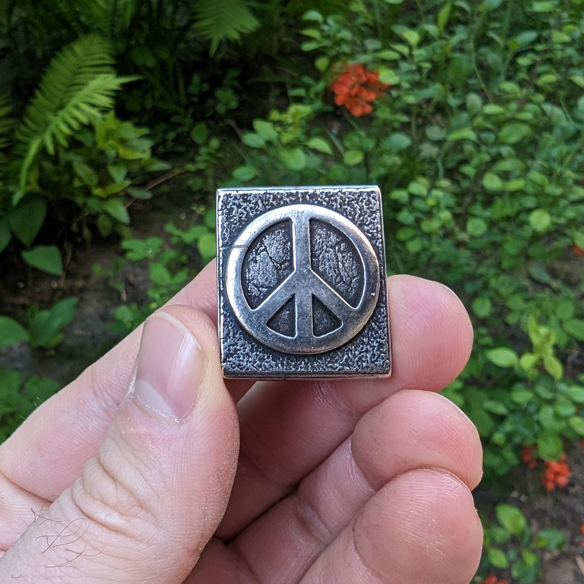 Peace symbol molle clip