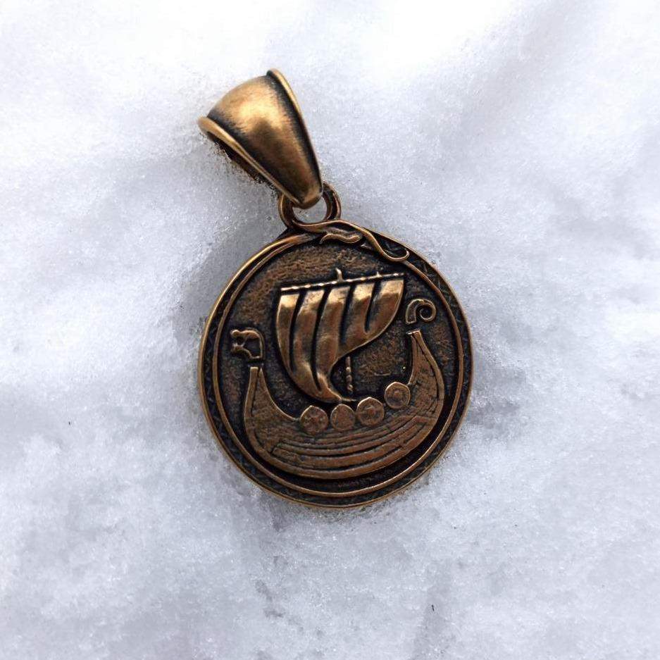 Viking long ship pendant with Vegvisir rune