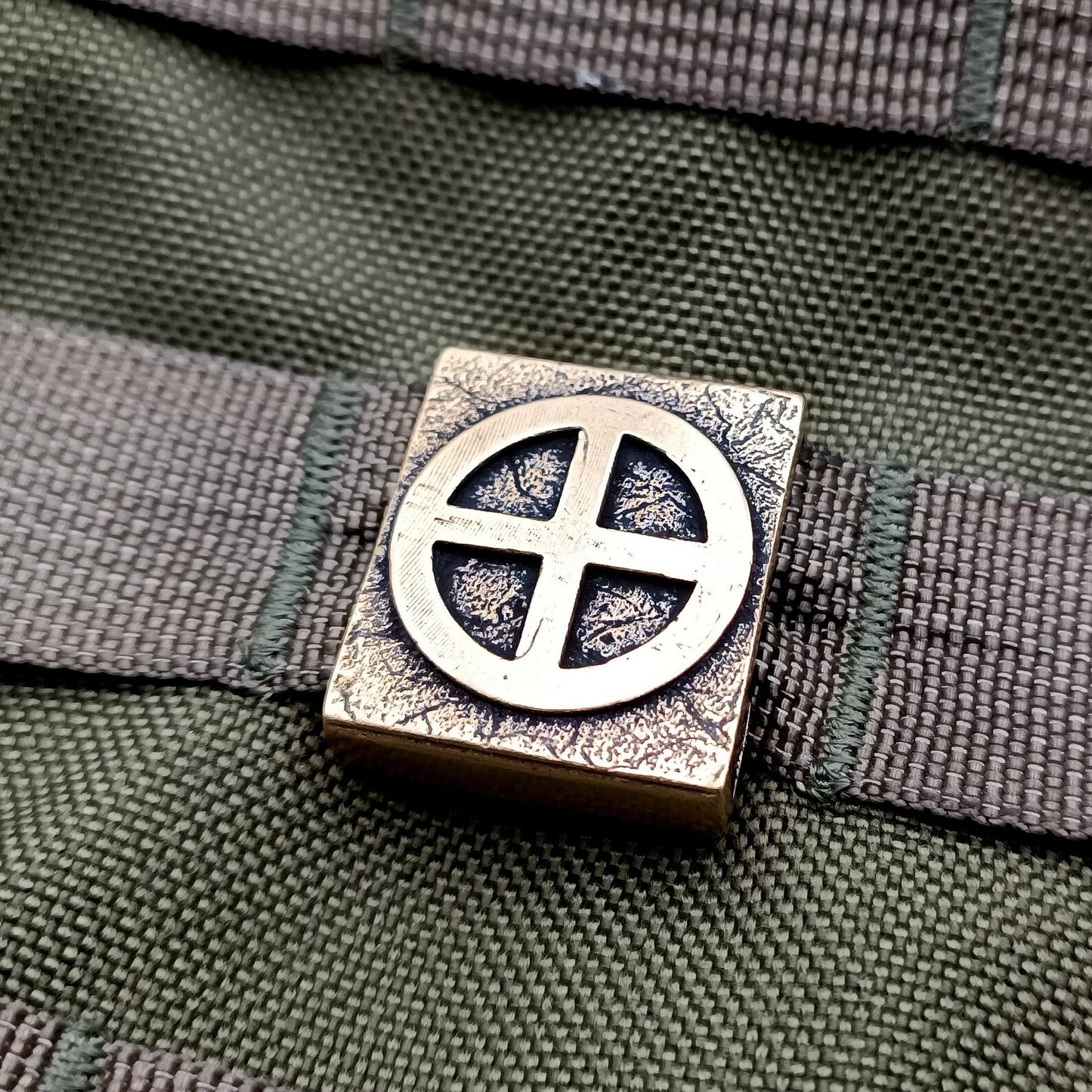Sun wheel molle clip
