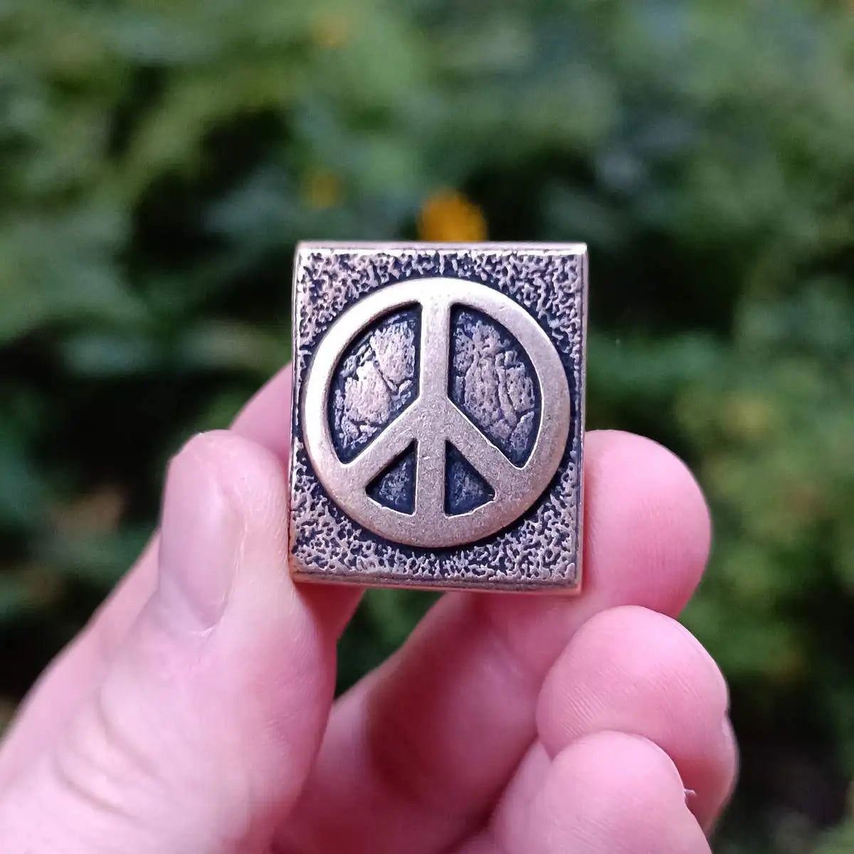 Peace symbol molle clip