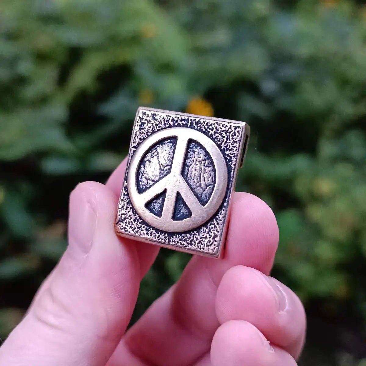 Peace symbol molle clip