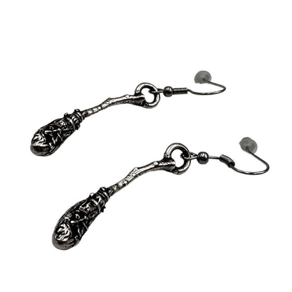 Witch's broom bronze earrings