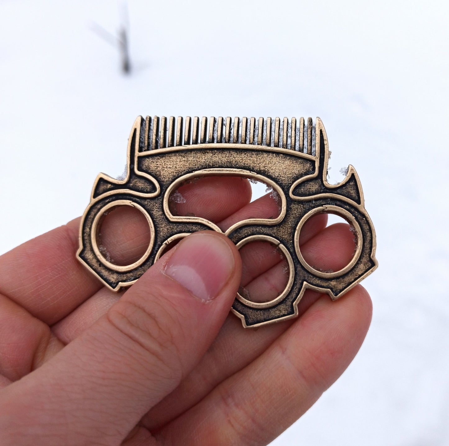 Brass knuckles beard comb