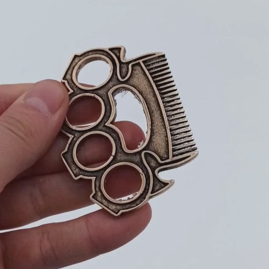 Brass knuckles beard comb
