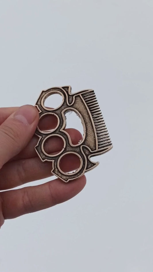 Brass knuckles beard comb