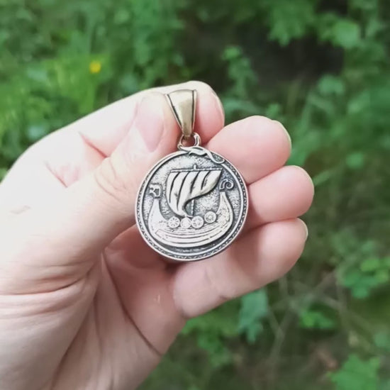 Viking long ship pendant with Vegvisir rune