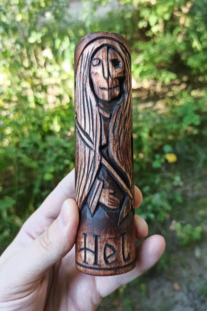 Hel wood carved statue