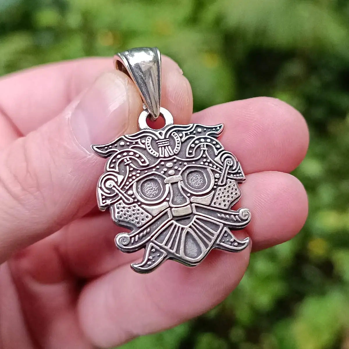 Loki mask pendant from silver