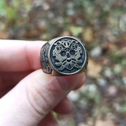 Loki mask ring from bronze