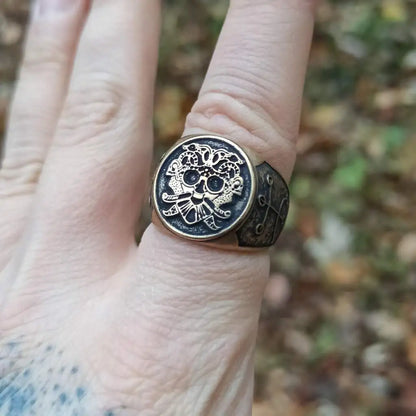 Loki mask ring from bronze