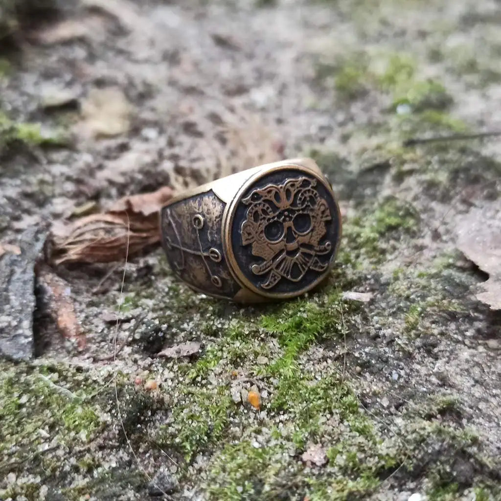 Loki mask ring from bronze   