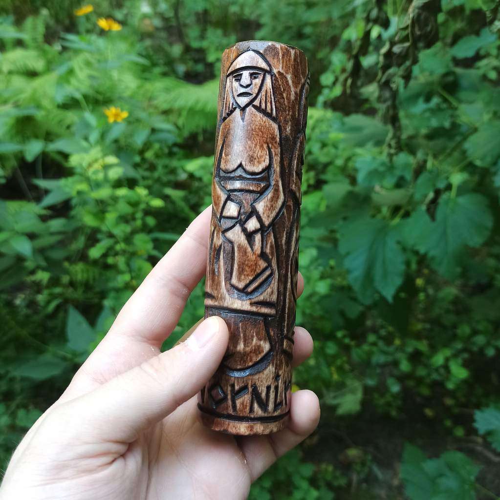 The Norns wooden statue   